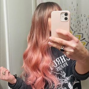 Ombré pink synthetic wig.